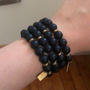 Set of four black beaded bracelets